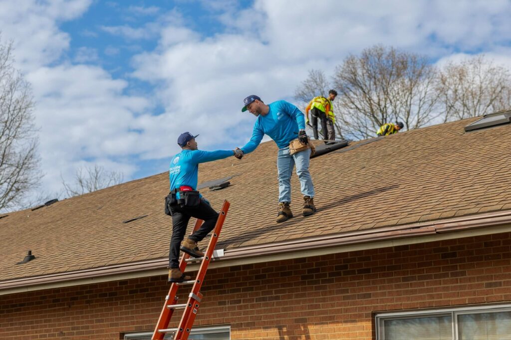 Escalade Roofing Climbing to Roof - Roof Installation Services