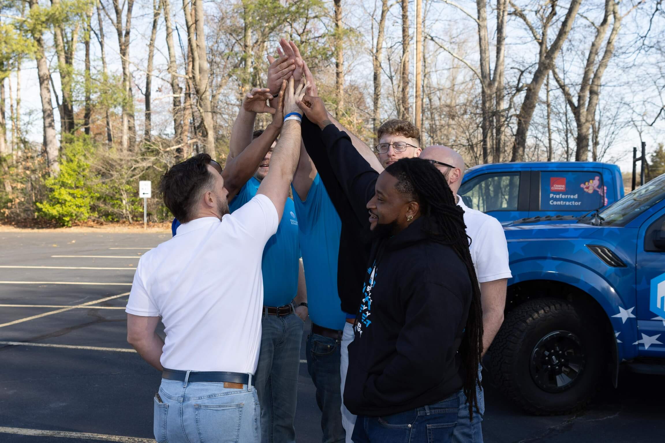 escalade roofing professional roofers team huddle charlotte nc
