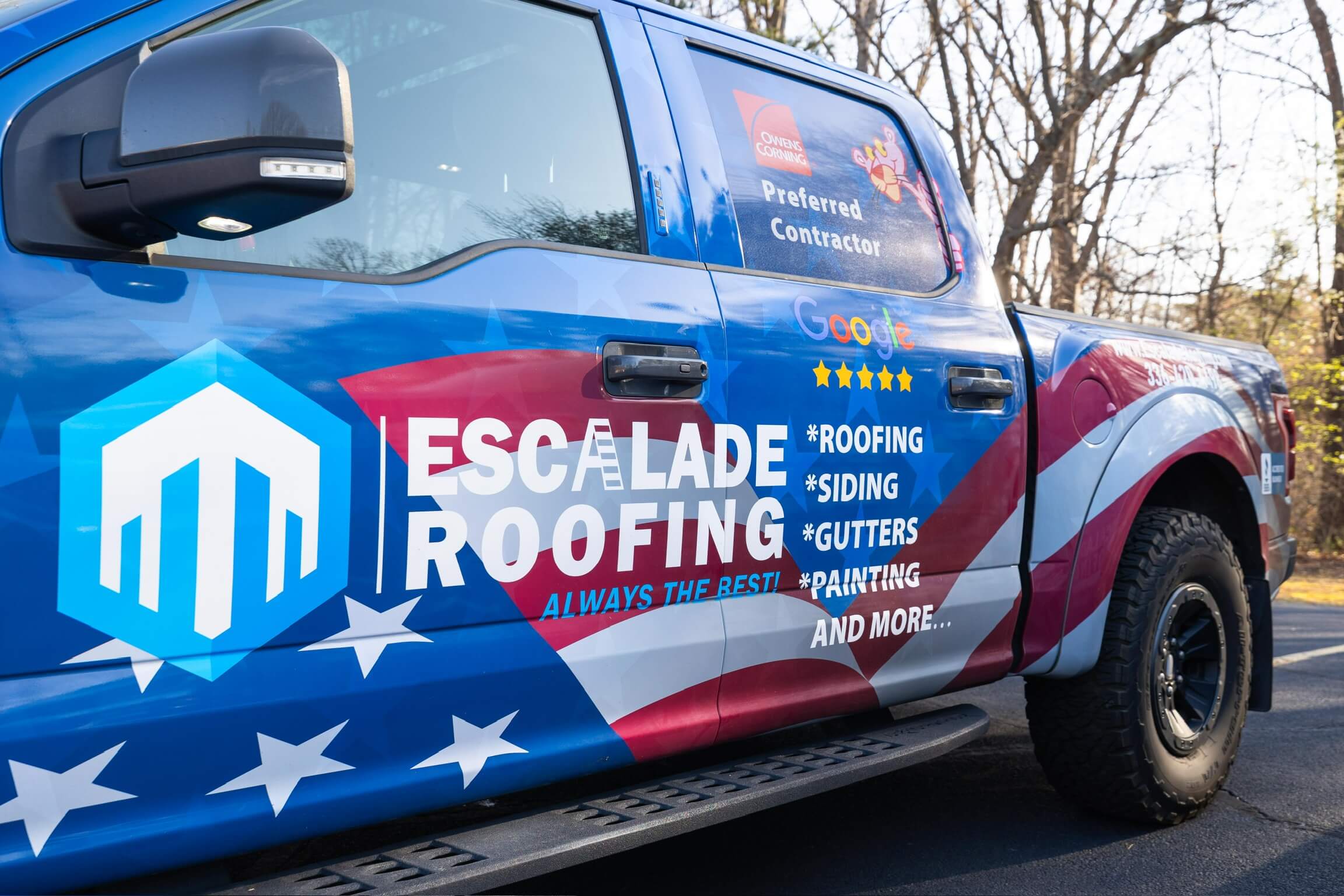 escalade roofing professional roofer logo on truck asheboro nc