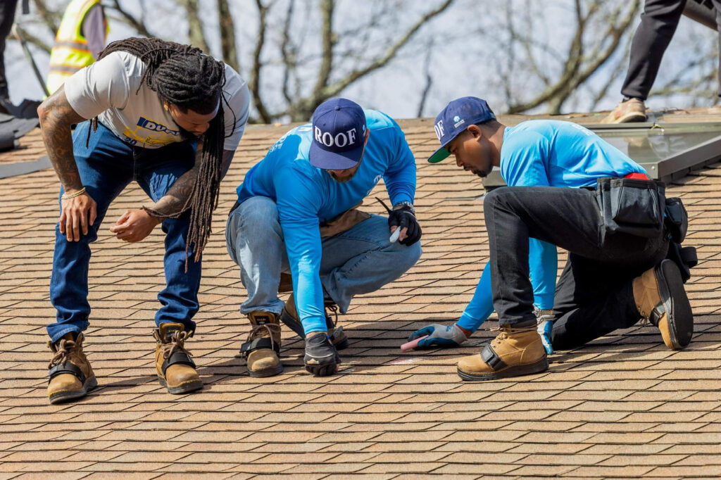 Escalade Roofing Team on Roof In Greensboro, NC